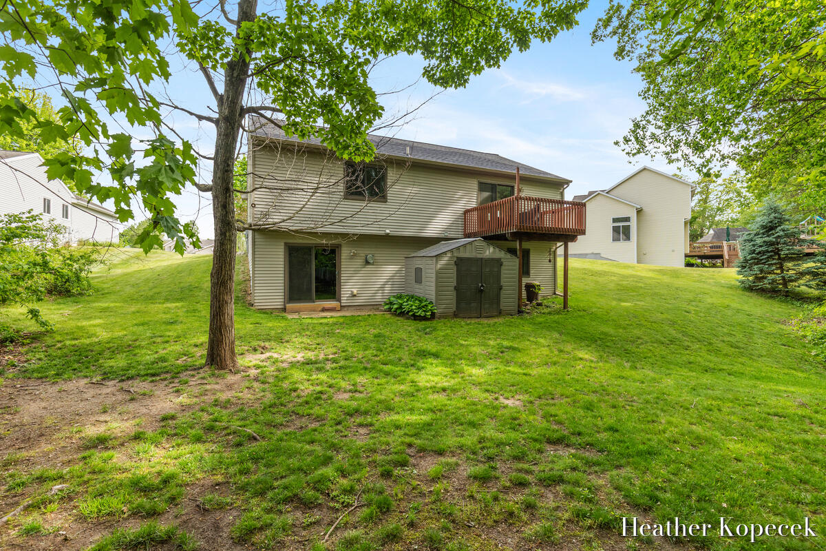 1663 Barnsley Court Southeast Lowell, MI 49331 - Photo 29 of 31 https___photoreal.io_wp-content_photorea