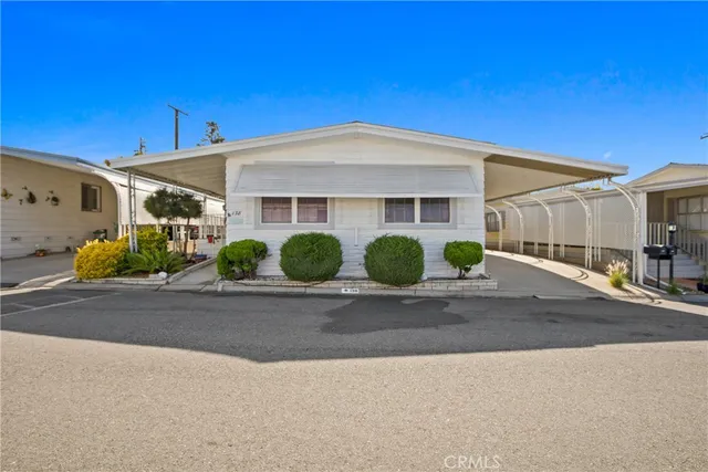 a view of a house with a street