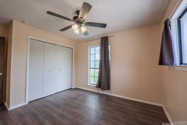 a bathroom with a shower and a shower