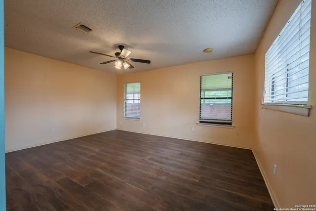 a bathroom with a sink a vanity and a mirror