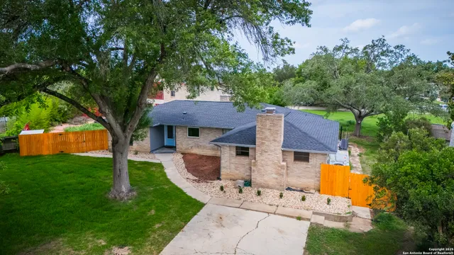 a front view of a house with patio
