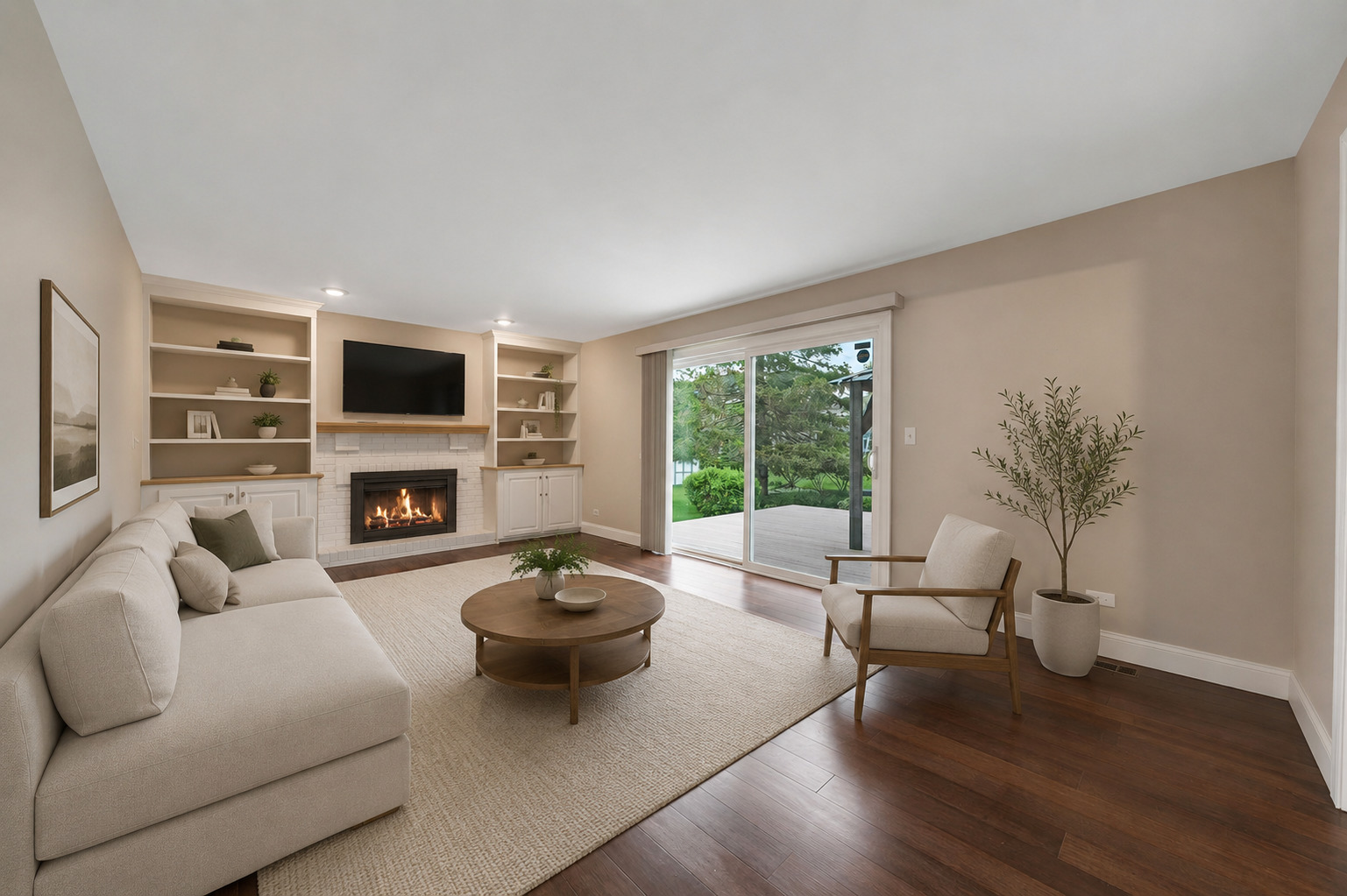 4977 Prairie Oak Road Gurnee, IL 60031 - Photo 11 of 26 a living room with furniture a fireplace and a potted plant
