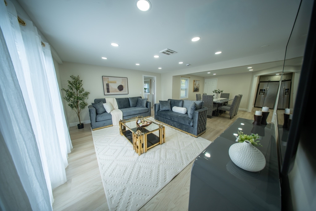 293 Brookfield Road Brimfield, MA 01010 - Photo 12 of 30 a living room with furniture and a table
