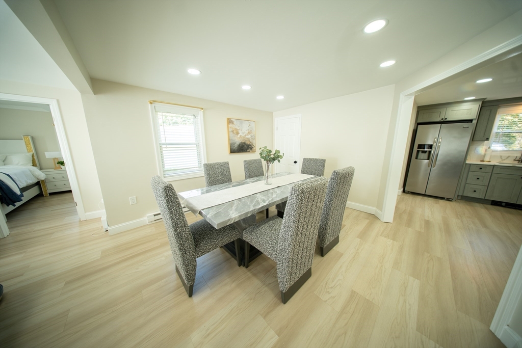 293 Brookfield Road Brimfield, MA 01010 - Photo 20 of 30 a view of a dining room with furniture and wooden floor