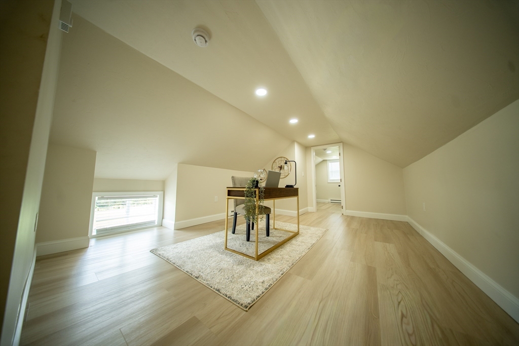 293 Brookfield Road Brimfield, MA 01010 - Photo 21 of 30 a view of a room with a furniture and wooden floor