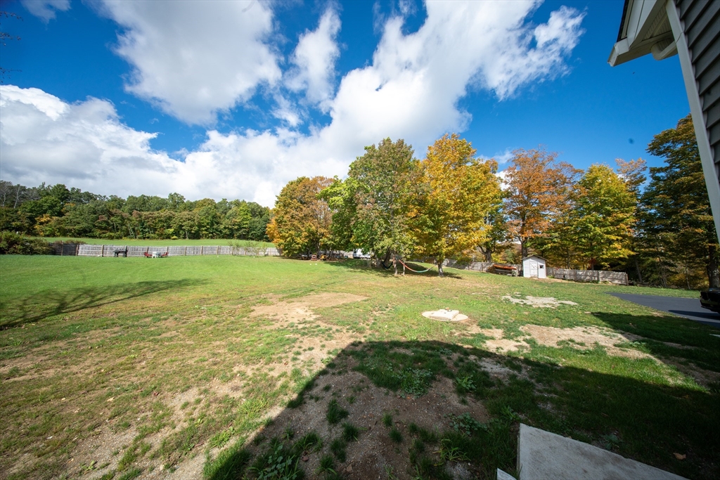 293 Brookfield Road Brimfield, MA 01010 - Photo 25 of 30 a view of a golf course with a lake