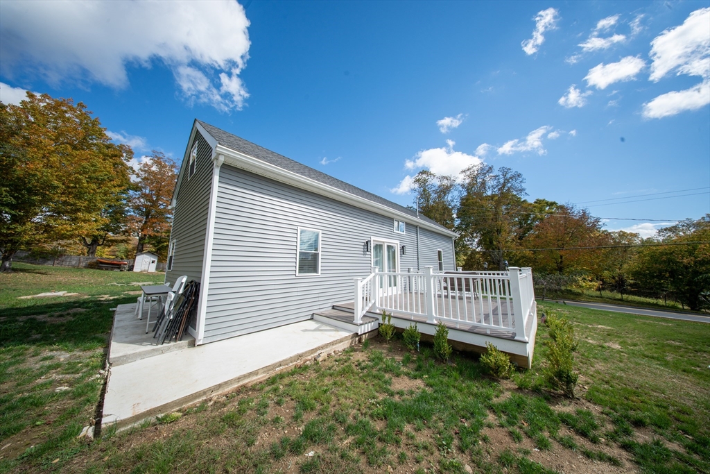 293 Brookfield Road Brimfield, MA 01010 - Photo 26 of 30 a front view of a house with garden