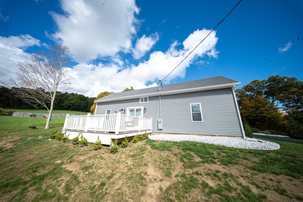 293 Brookfield Road Brimfield, MA 01010 - Photo 27 of 30 a view of a house with a yard