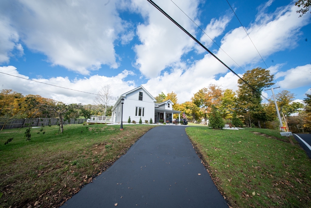 293 Brookfield Road Brimfield, MA 01010 - Photo 3 of 30 a view of a house with a big yard