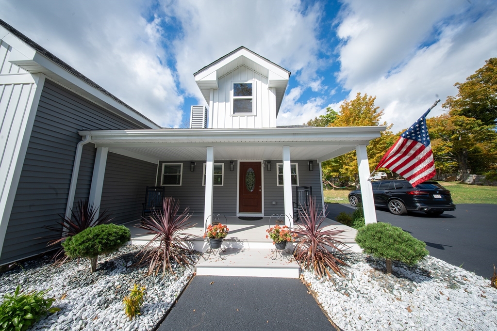 293 Brookfield Road Brimfield, MA 01010 - Photo 4 of 30 a view of a house with a patio