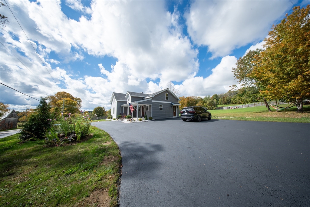 293 Brookfield Road Brimfield, MA 01010 - Photo 5 of 30 a view of a street with houses
