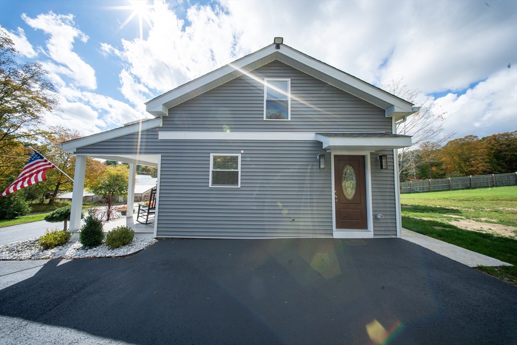 293 Brookfield Road Brimfield, MA 01010 - Photo 6 of 30 a front view of a house with a yard