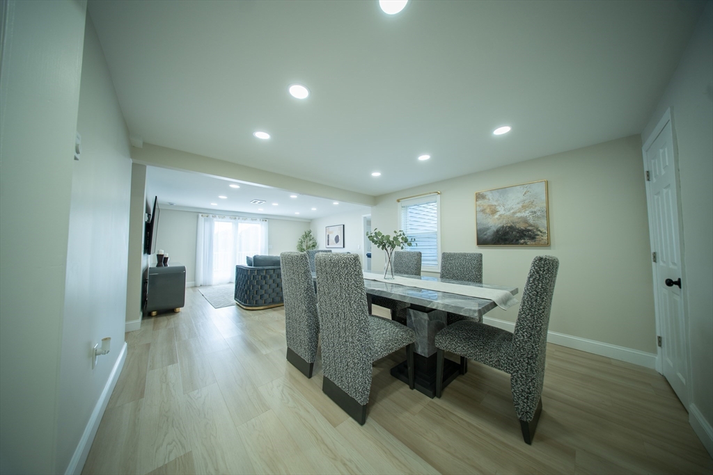 293 Brookfield Road Brimfield, MA 01010 - Photo 10 of 30 a view of a dining room with furniture and wooden floor
