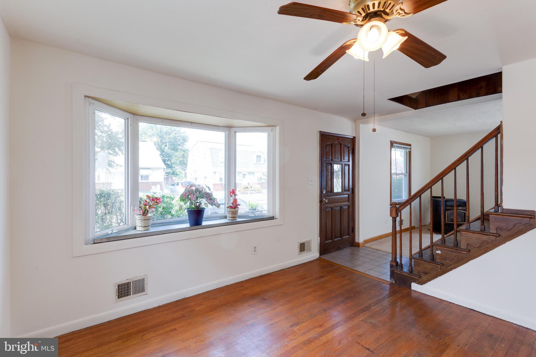 135 Cedar Hill Road Baltimore, MD 21225 - Photo 11 of 48 Pretty Front Bay Window lots of light