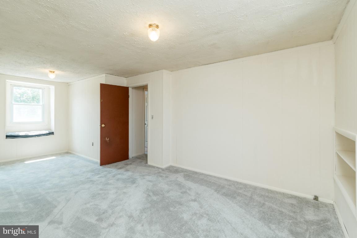 135 Cedar Hill Road Baltimore, MD 21225 - Photo 30 of 48 Master Bedroom with built in shelves