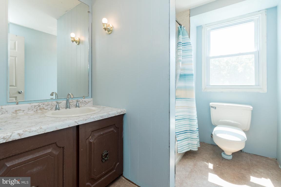 135 Cedar Hill Road Baltimore, MD 21225 - Photo 35 of 48 Fresh painted upstairs bathroom 2