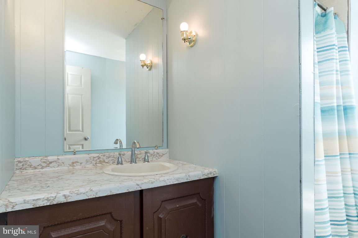 135 Cedar Hill Road Baltimore, MD 21225 - Photo 36 of 48 Fresh painted upstairs bathroom 2
