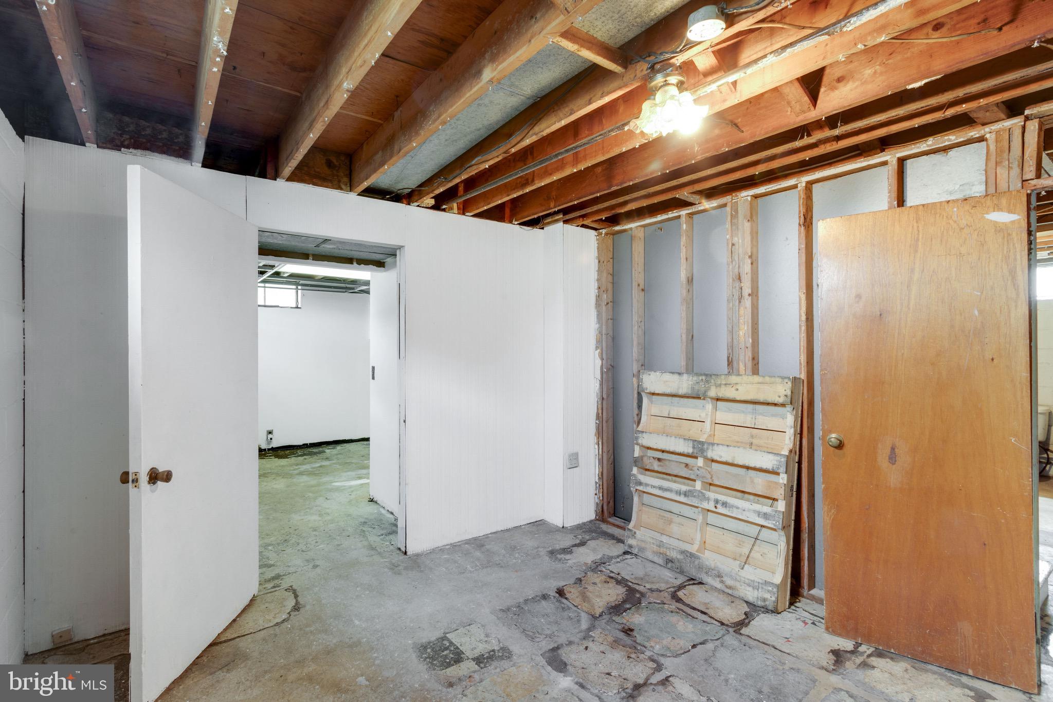135 Cedar Hill Road Baltimore, MD 21225 - Photo 38 of 48 Basement Storage Area