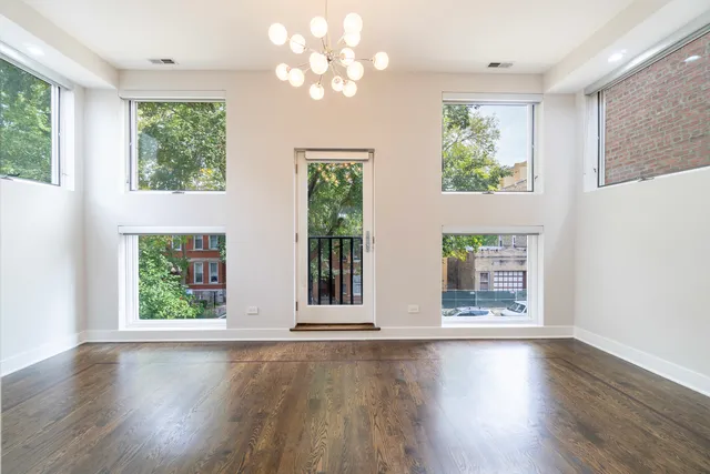 a view of livingroom with hardwood floor and window