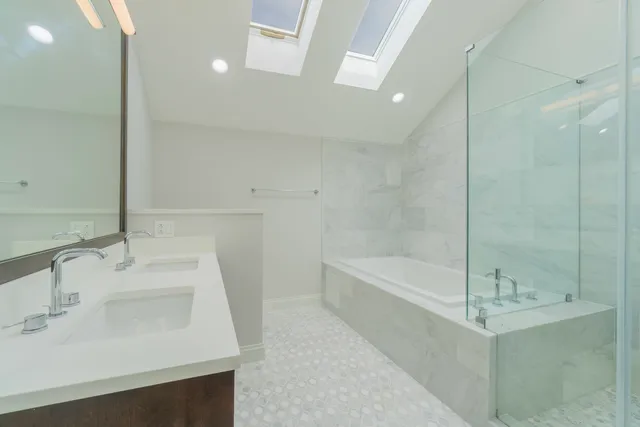 a bathroom with a sink and a bathtub