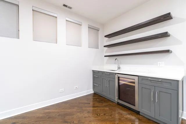 a kitchen with stainless steel appliances granite countertop a sink and dishwasher