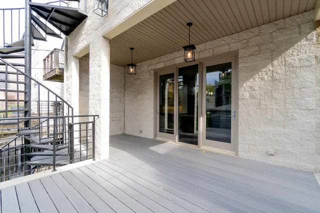 a view of a backyard with potted plants