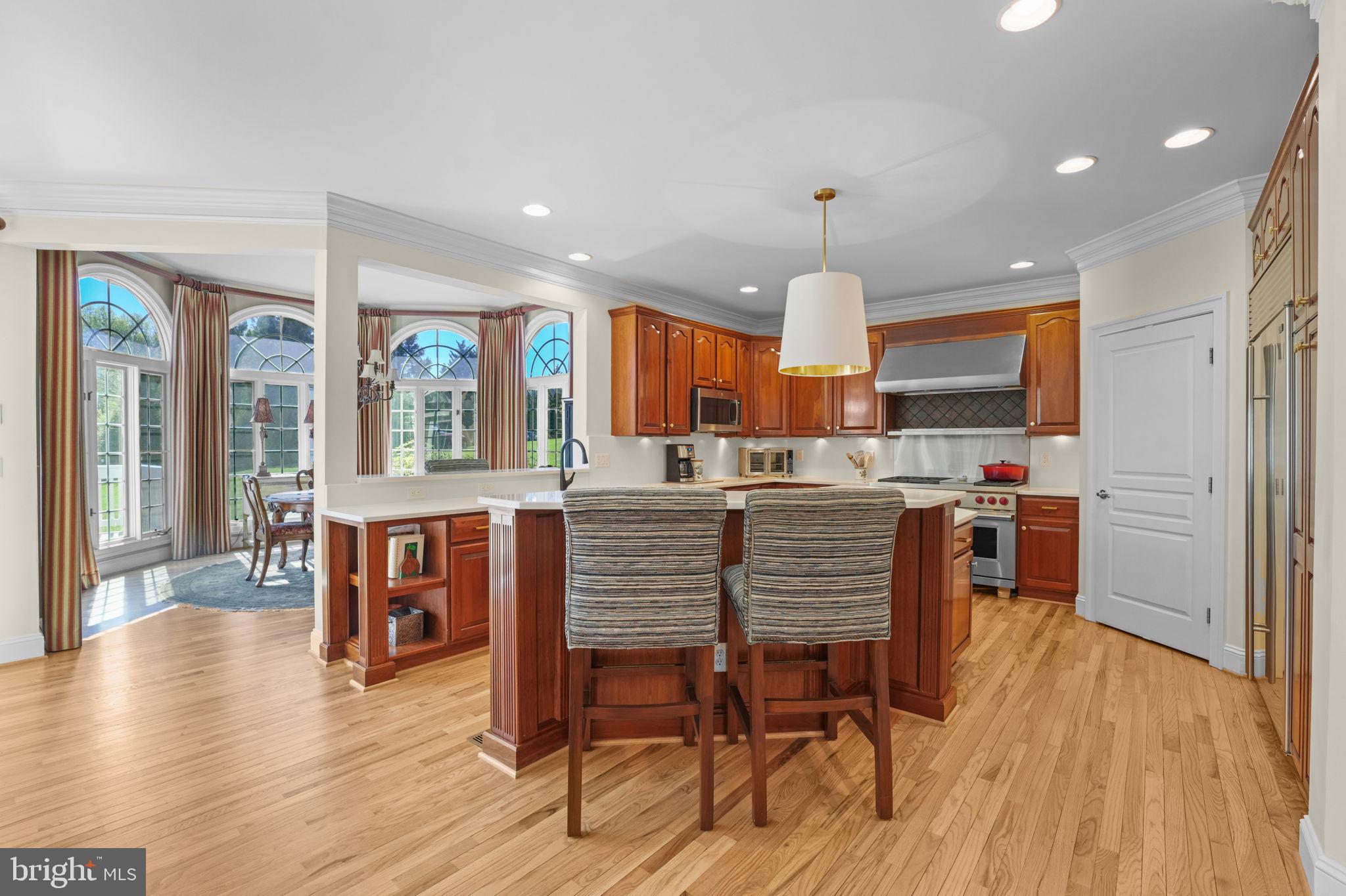 11431 Woolington Road Great Falls, VA 22066 - Photo 12 of 49 Kitchen island overlooks morning room