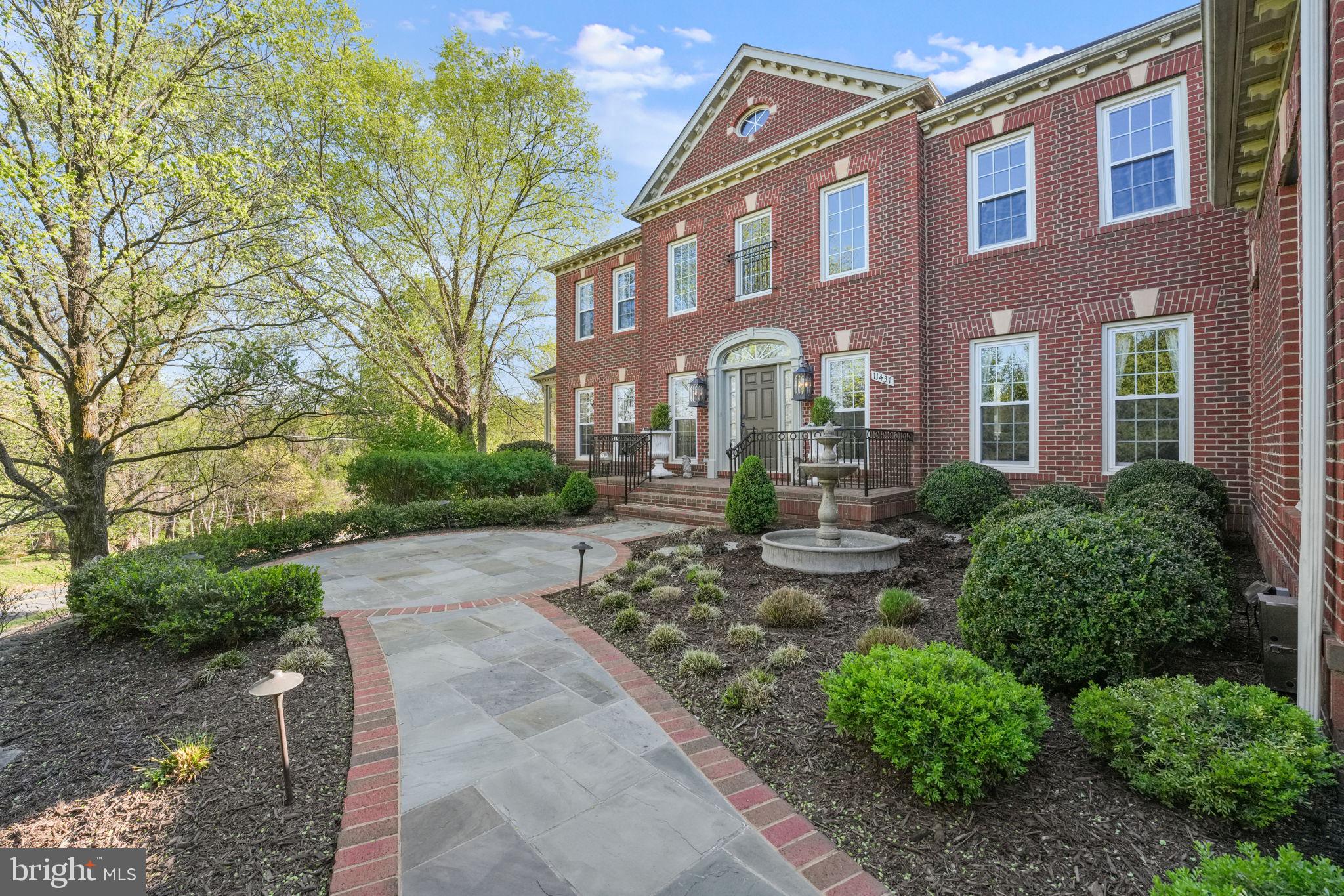 11431 Woolington Road Great Falls, VA 22066 - Photo 2 of 49 Flagstone & brick walkway. Fountain.
