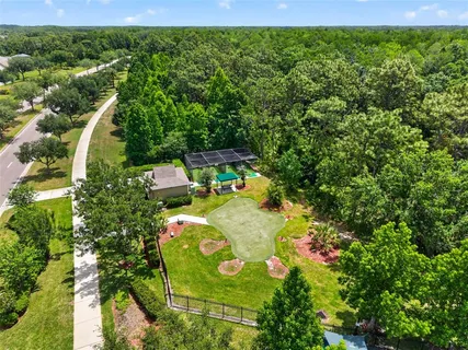 an aerial view of a house with a garden