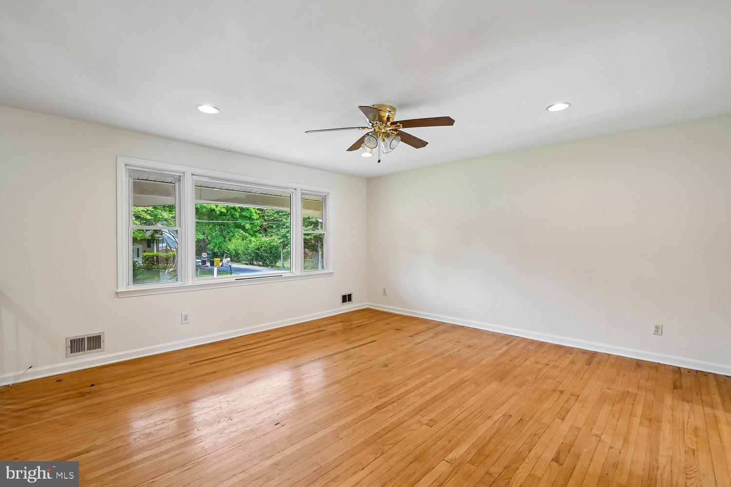 7879 Elizabeth Road Pasadena, MD 21122 - Photo 8 of 36 Living Room with Hardwood Flooring