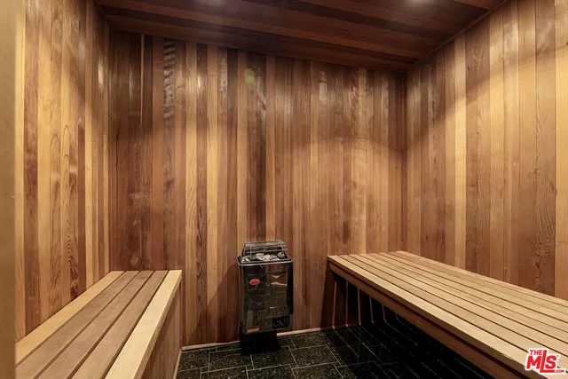 a view of a balcony with trees
