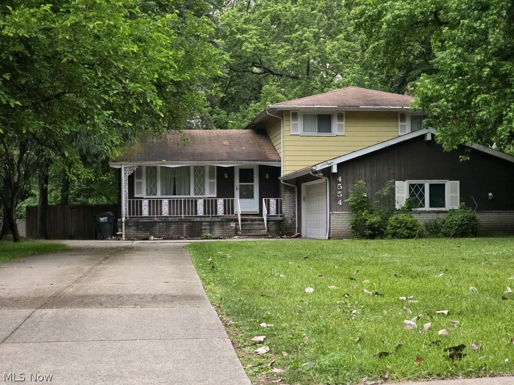 4554 Green Road Cleveland, OH 44128 - Photo 1 of 16 Split level home with a garage and a front yard