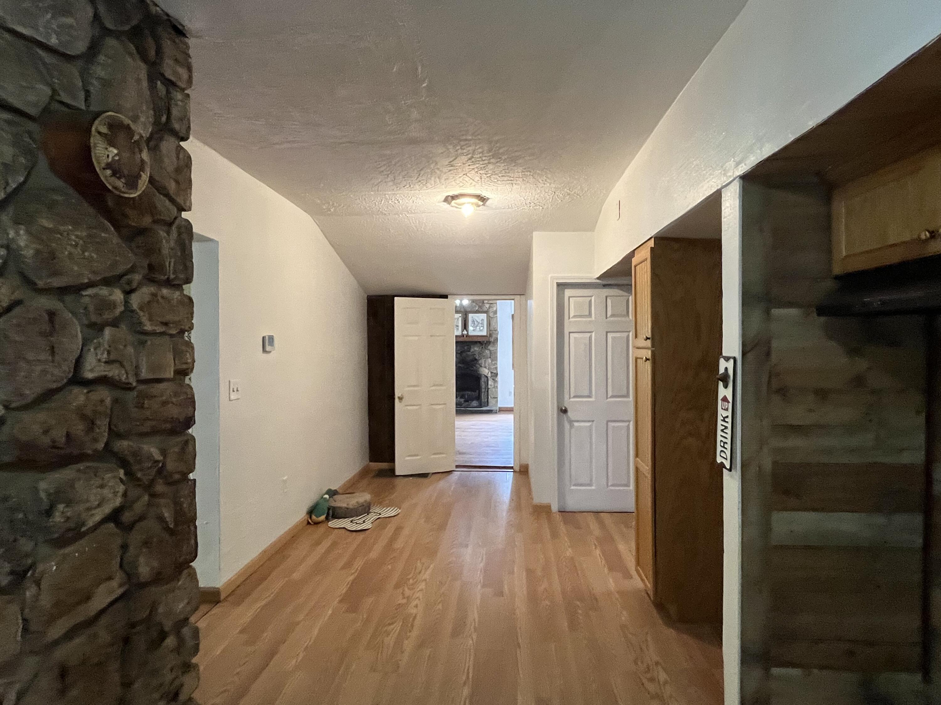 1669-1705 Bethany Road Callaway, VA 24067 - Photo 12 of 45 a view of a hallway with wooden floor