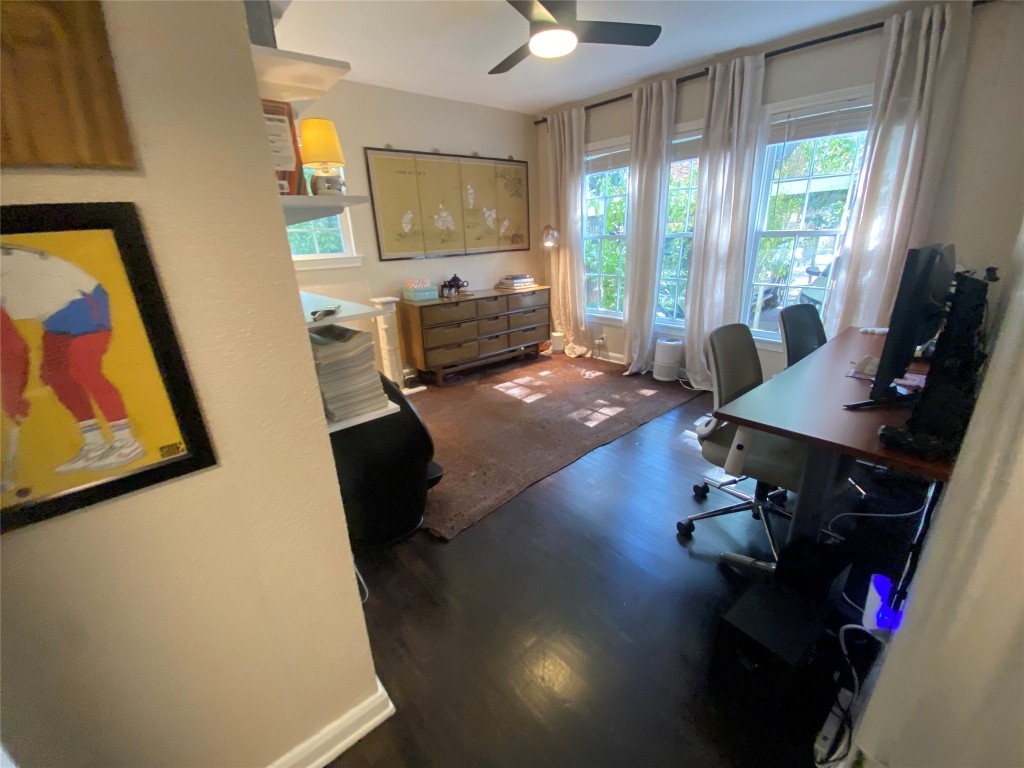 1404 West 12th Street, Unit C Austin, TX 78703 - Photo 13 of 34 a living room with furniture and a flat screen tv