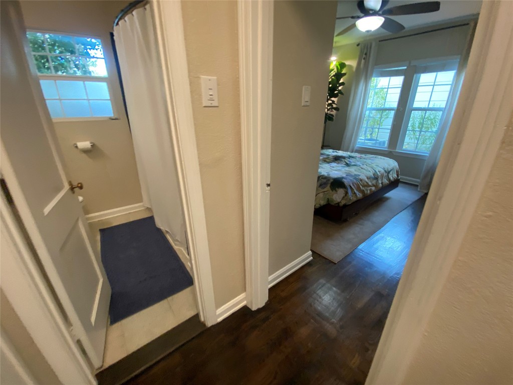 1404 West 12th Street, Unit C Austin, TX 78703 - Photo 14 of 34 a view of a hallway and a livingroom with furniture