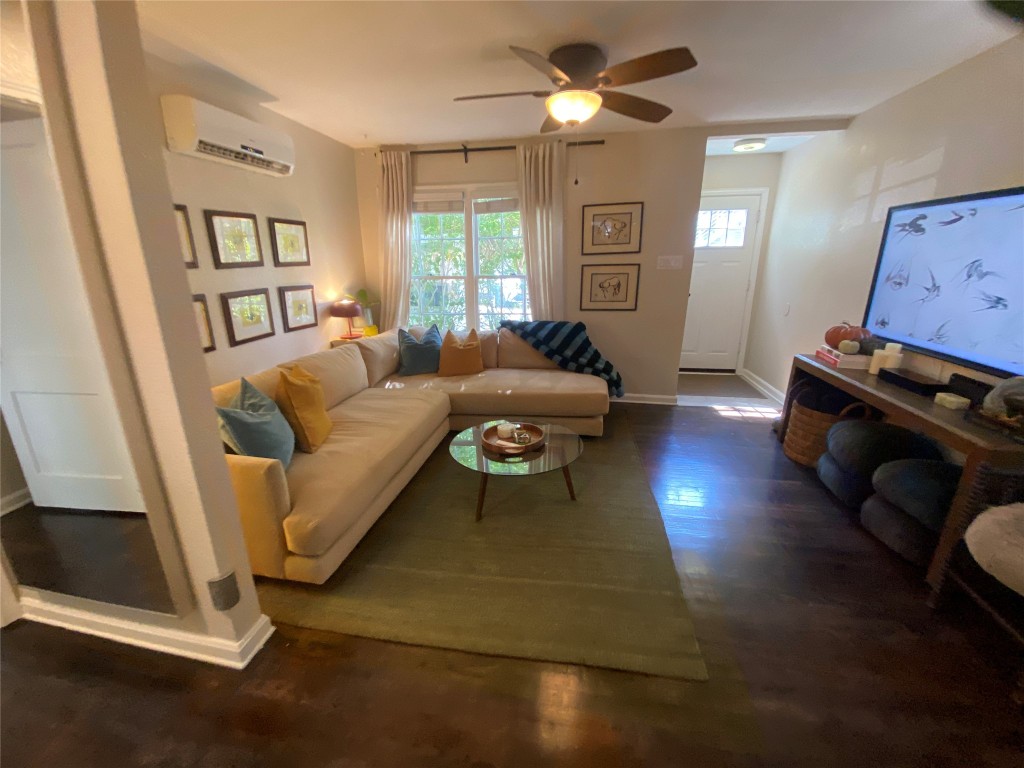 1404 West 12th Street, Unit C Austin, TX 78703 - Photo 23 of 34 a living room with furniture and a wooden floor