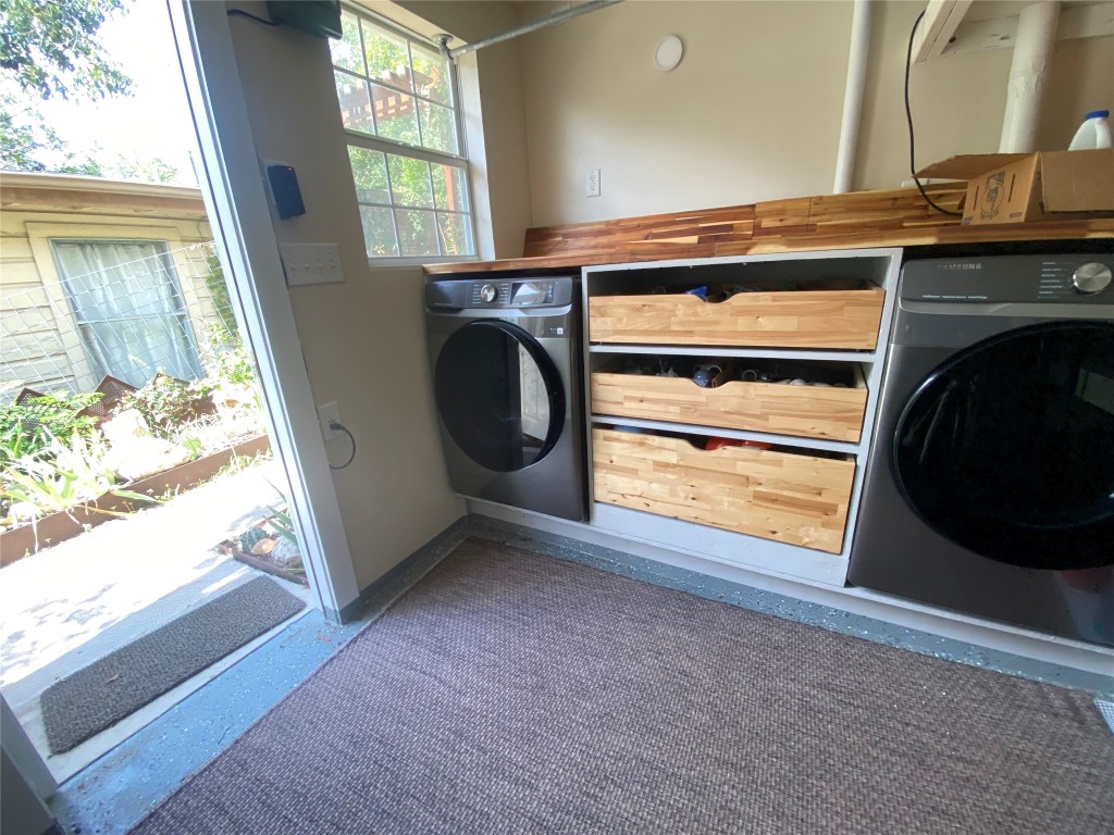 1404 West 12th Street, Unit C Austin, TX 78703 - Photo 28 of 34 a view of washer and dryer in a room