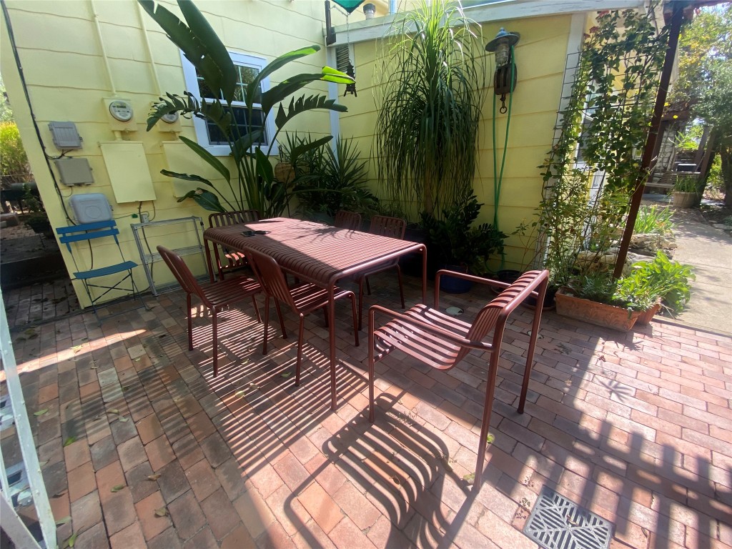 1404 West 12th Street, Unit C Austin, TX 78703 - Photo 34 of 34 a view of a backyard with sitting area