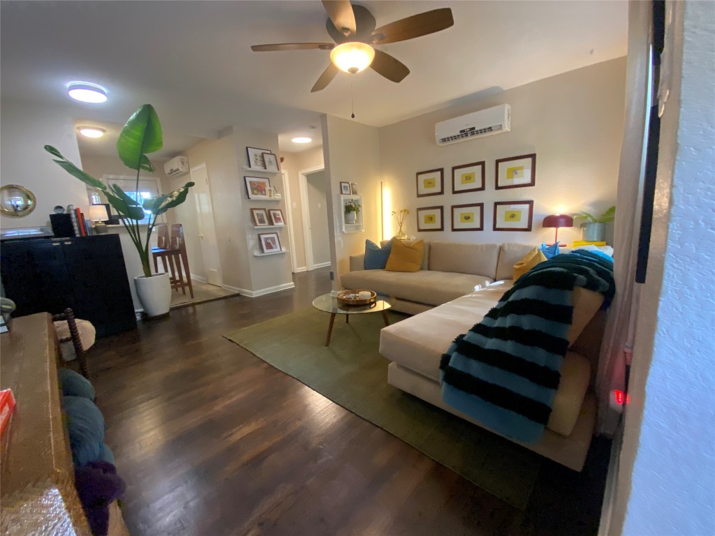 1404 West 12th Street, Unit C Austin, TX 78703 - Photo 5 of 34 a living room with furniture and a wooden floor