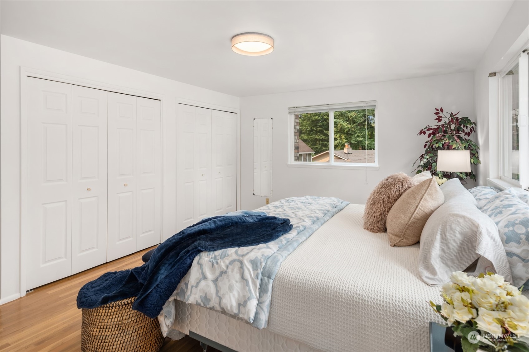 9523 Northeast 198th Street Bothell, WA 98011 - Photo 18 of 39 a bedroom with a bed and a window