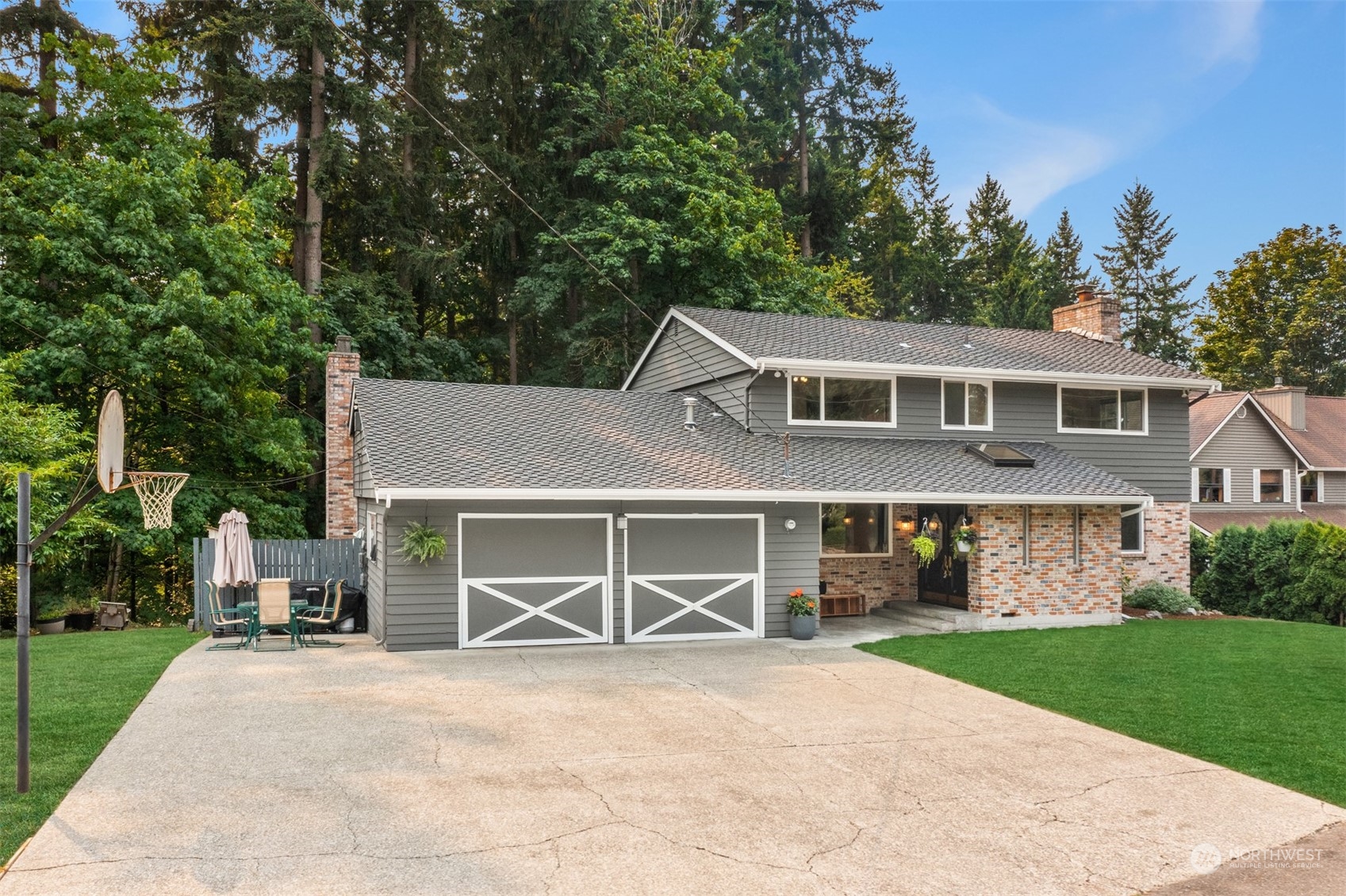 9523 Northeast 198th Street Bothell, WA 98011 - Photo 2 of 39 front view of a house with a yard