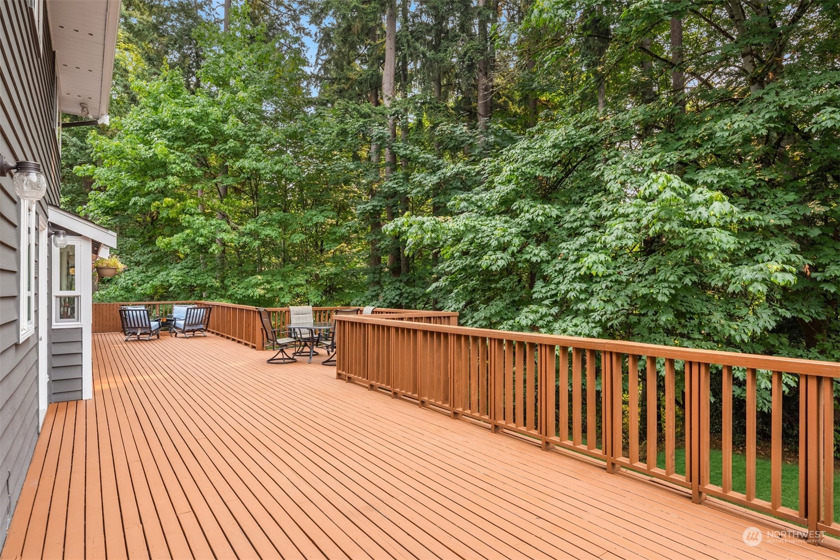 9523 Northeast 198th Street Bothell, WA 98011 - Photo 30 of 39 a view of balcony with wooden floor and fence