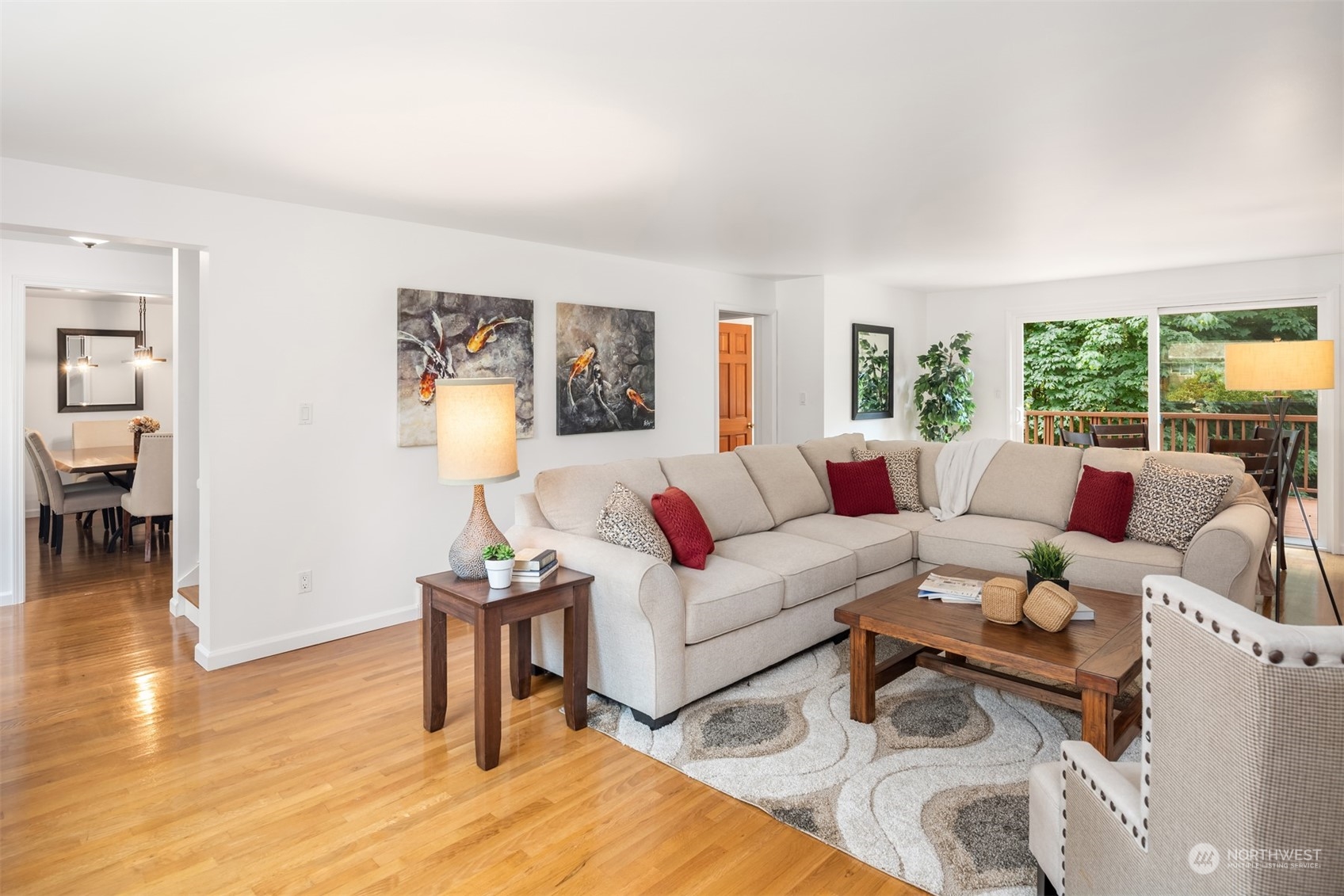 9523 Northeast 198th Street Bothell, WA 98011 - Photo 3 of 39 a living room with furniture and a wooden floor