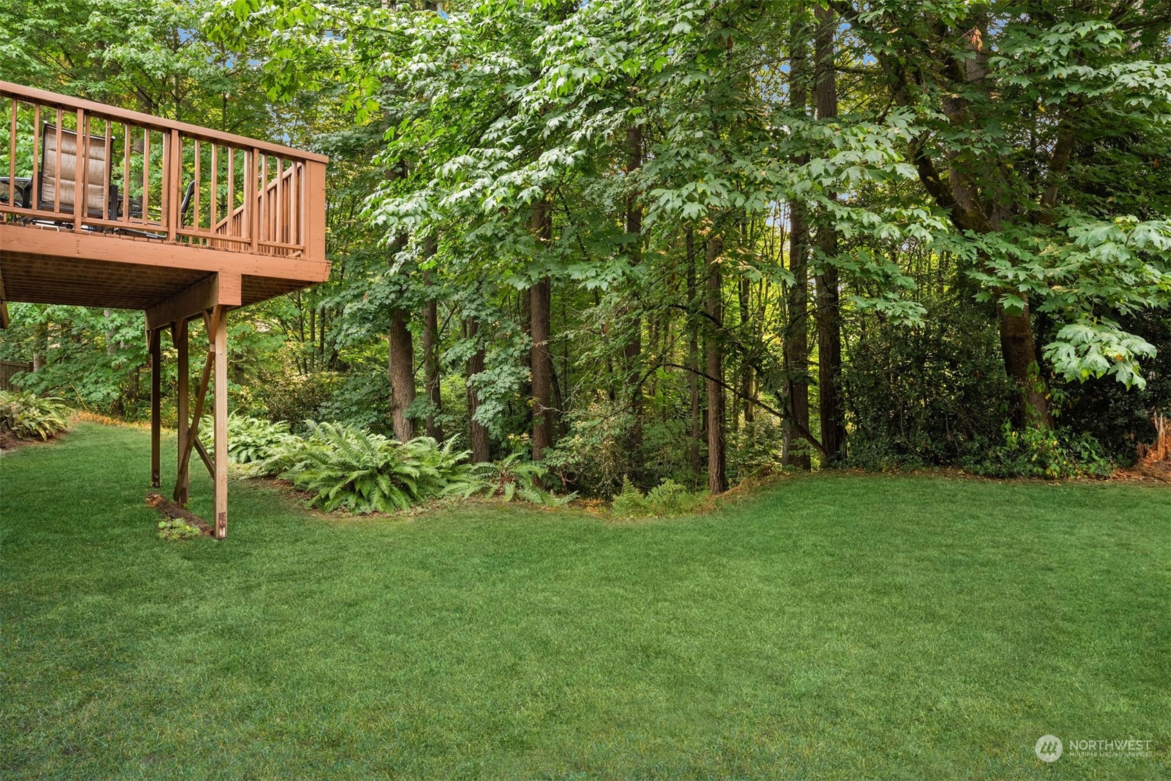 9523 Northeast 198th Street Bothell, WA 98011 - Photo 33 of 39 a view of a house with a backyard