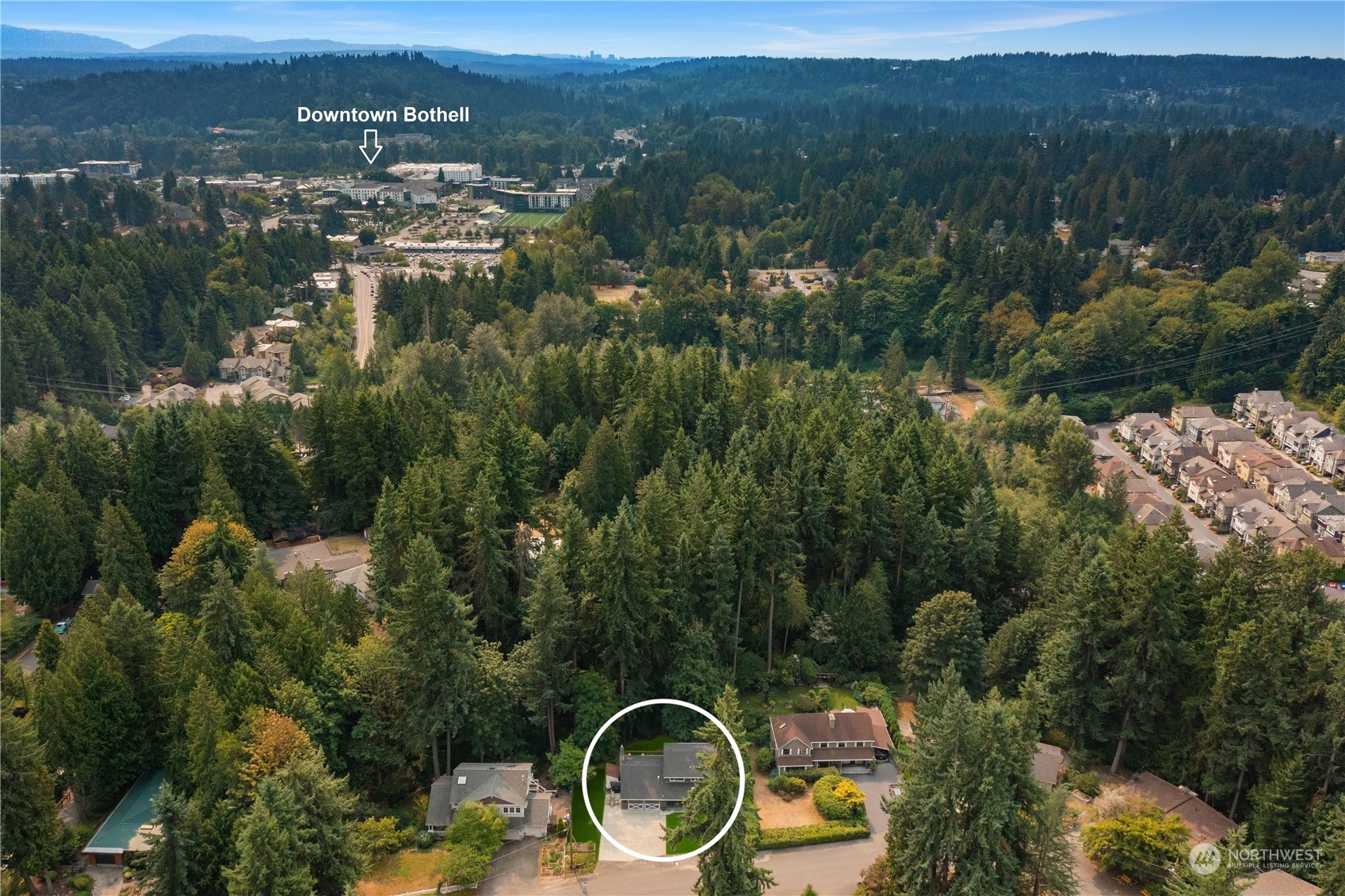 9523 Northeast 198th Street Bothell, WA 98011 - Photo 35 of 39 a aerial view of a house with mountain view