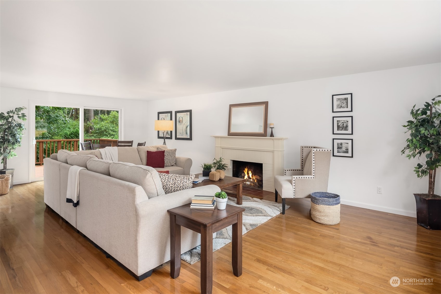 9523 Northeast 198th Street Bothell, WA 98011 - Photo 4 of 39 a living room with furniture and a fireplace