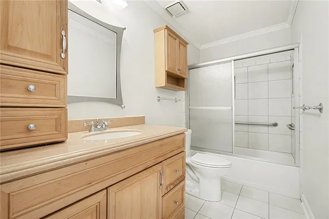 an empty room with a window and a ceiling fan