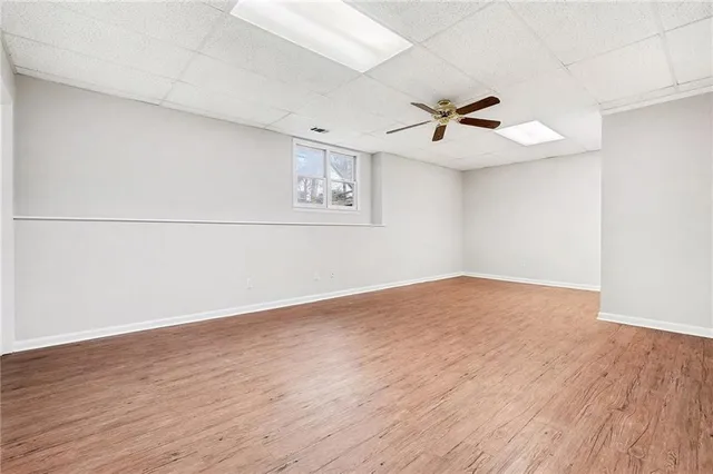 a bathroom with a toilet a sink and shower