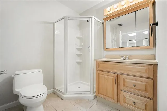 a view of an empty room with empty shelves