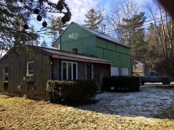 60 Streeter Road Sturbridge, MA 01518 - Photo 1 of 7 a view of a house with a yard